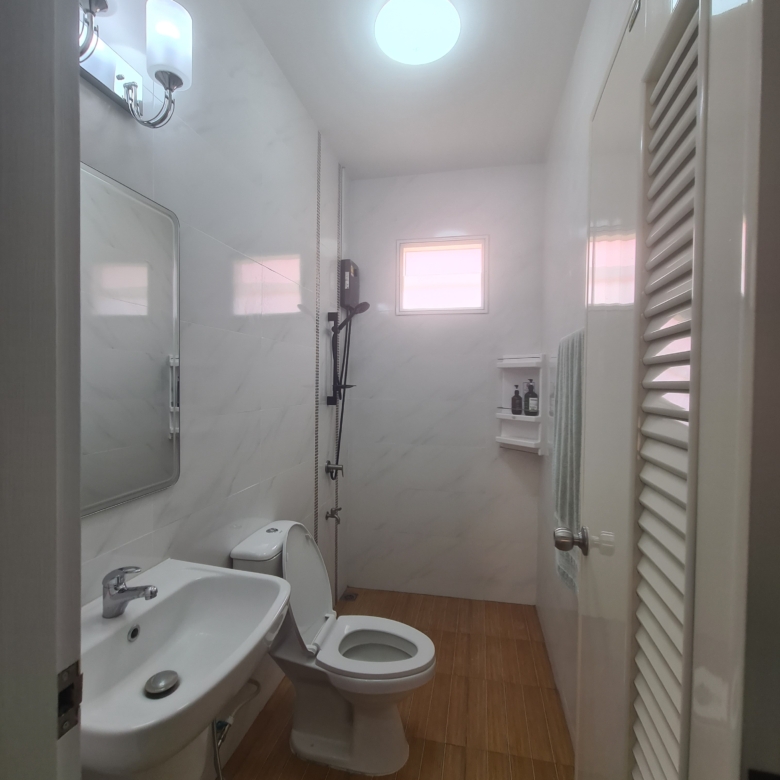 Fully furnished 2-bedroom house for sale in Bang Saray with mountain views, private parking, and easy access to Pattaya and Bangkok.