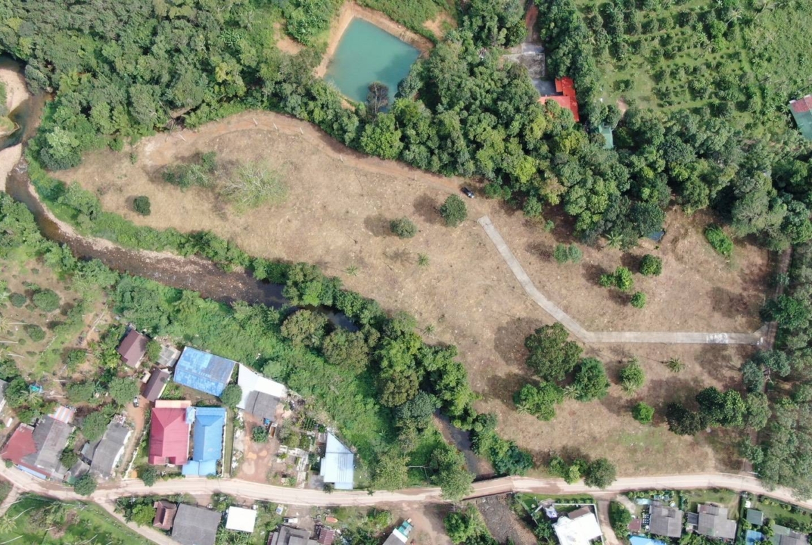 Vacant land for sale in a prime location with flexible plot sizes, ready to build, featuring Chanote title and utility connections. Contact Koh Chang Properties - 0827924963