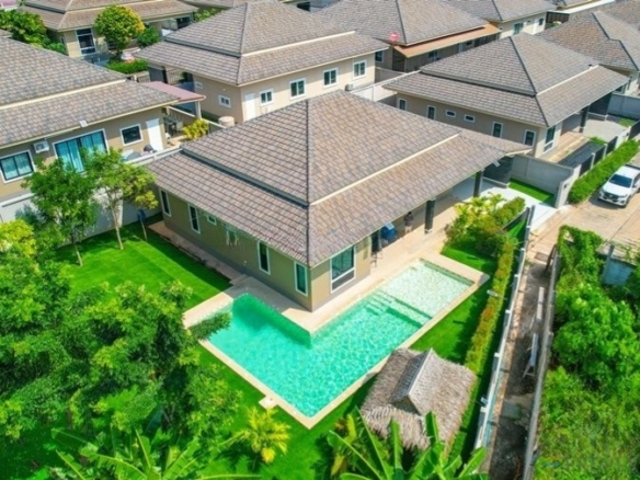 Elegant 5-bedroom pool villa with landscaped garden and private jacuzzi, presented by Koh Chang Properties