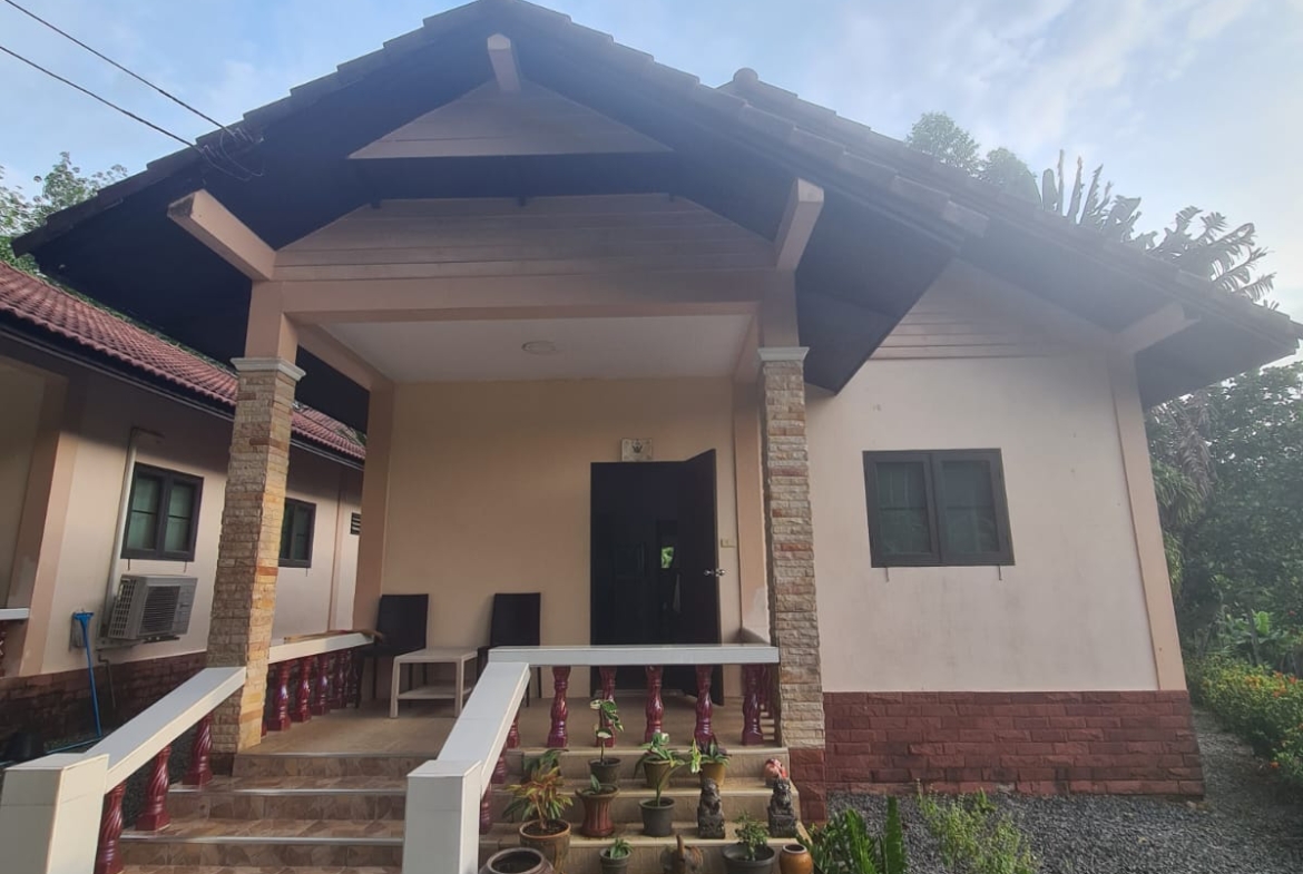 Fully furnished 1-bedroom and 2-bedroom hillside rental houses in KaiBae Beach, Koh Chang with balconies and private parking.